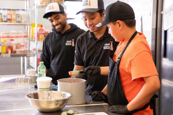 bouncing-pika-kids-learning-cooking-in-kitchen-with-instructors